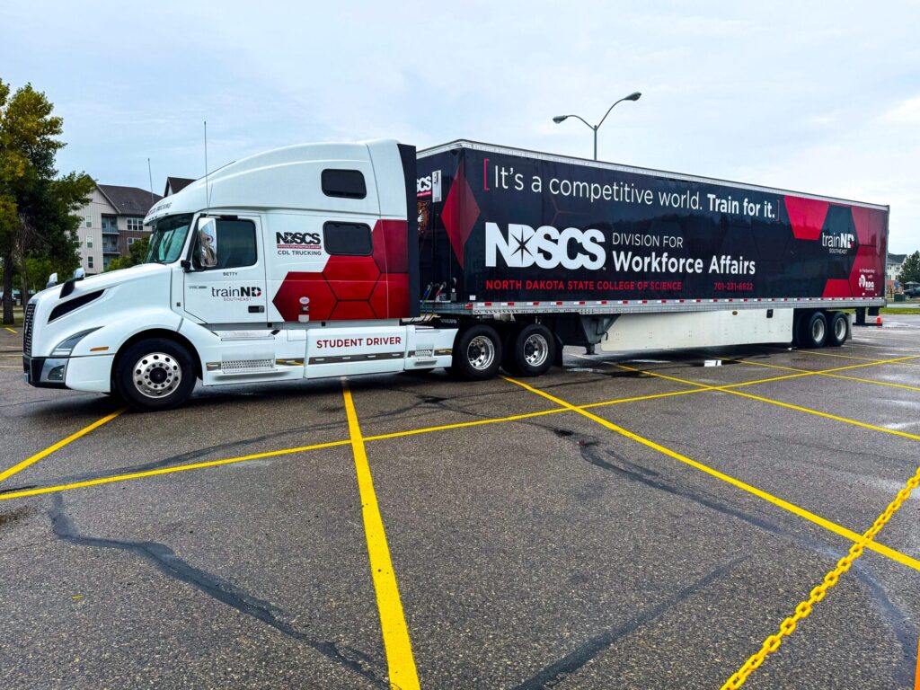 Semi truck and trainer with NDSCS logo